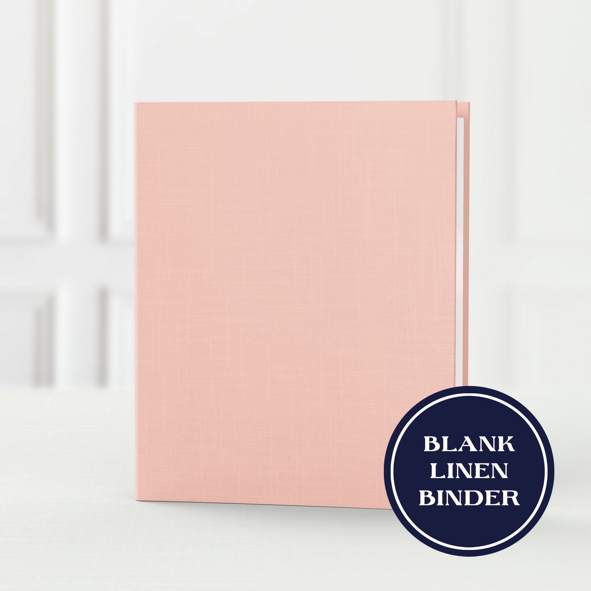 Pink linen binder on a white background with 'Blank Linen Binder' text.
