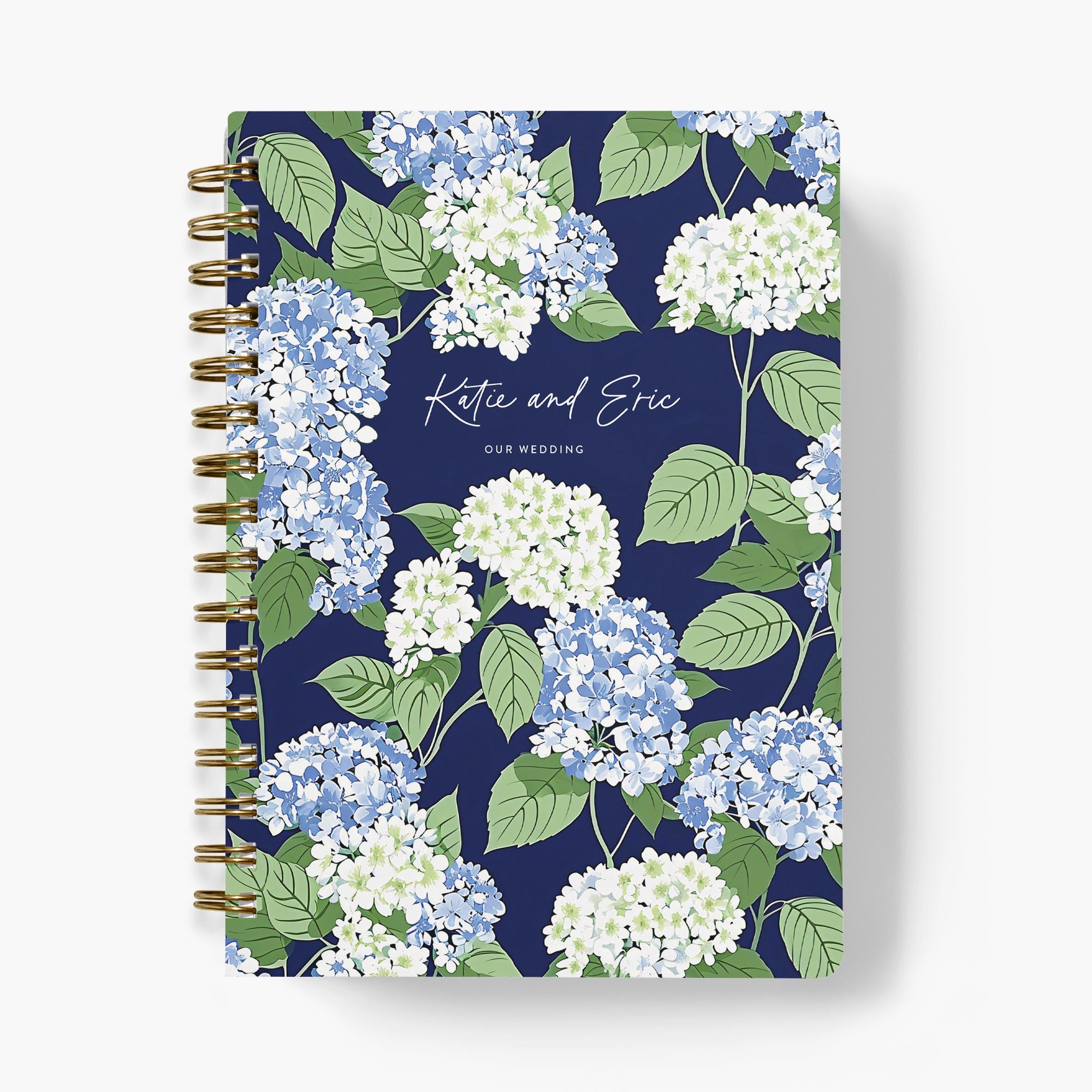 Wedding planner with blue and white Cape hydrangea floral cover on a white background
