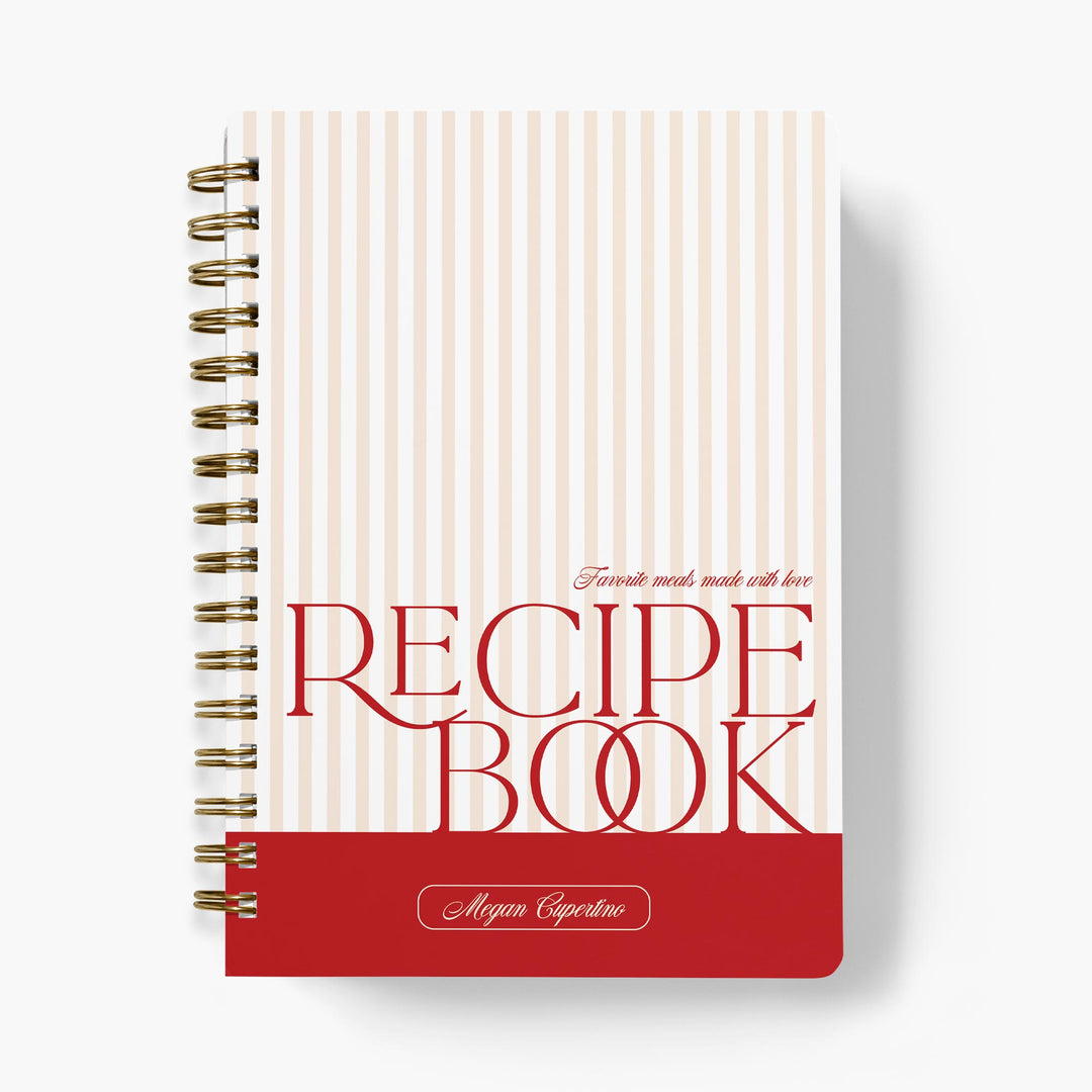 Custom recipe journal with a classic stripe design in red and pink, paired with bold text and bound with gold wire