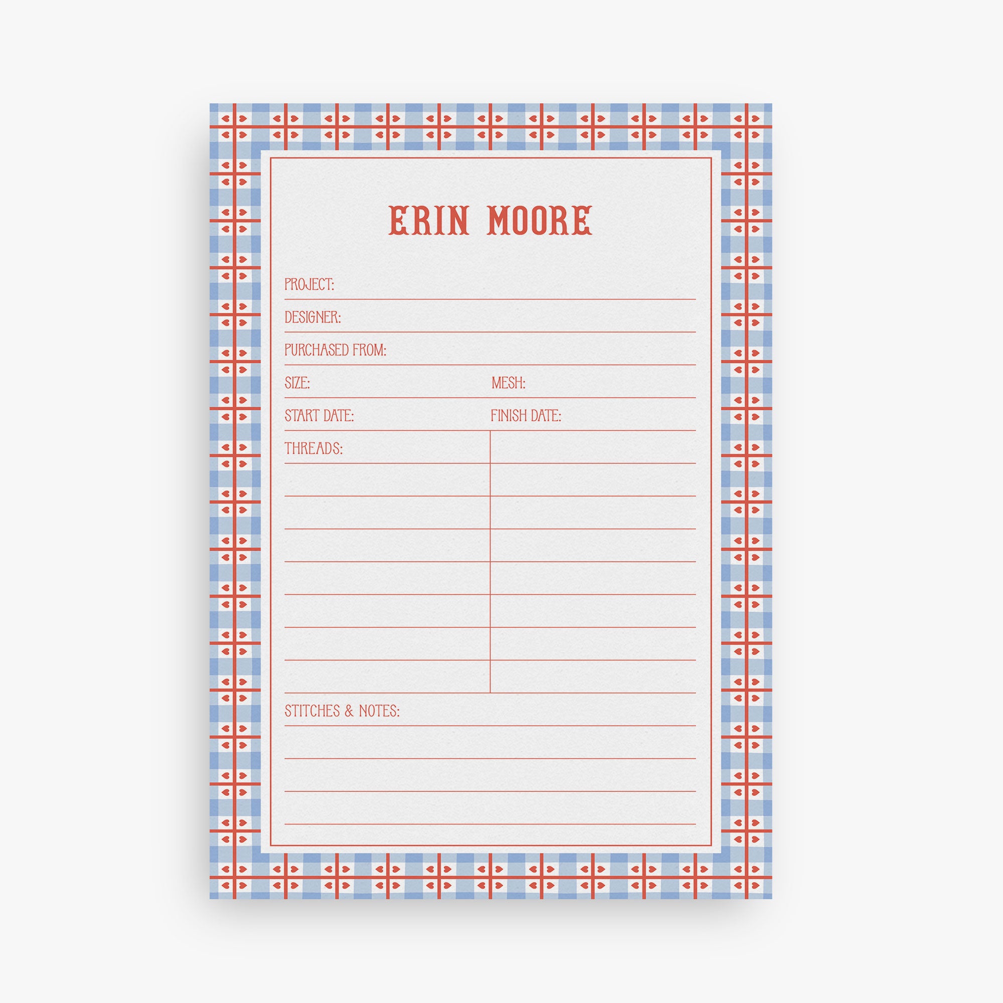 Custom needlepoint project notepad with a checkered border and hearts on a white background