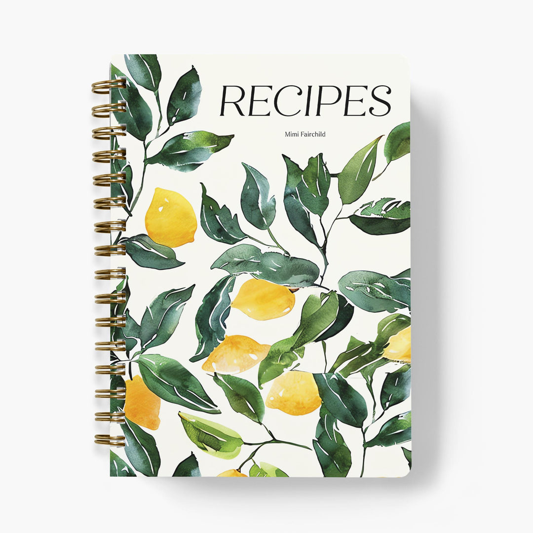 Custom recipe journal with lemon and leaf design on a white background
