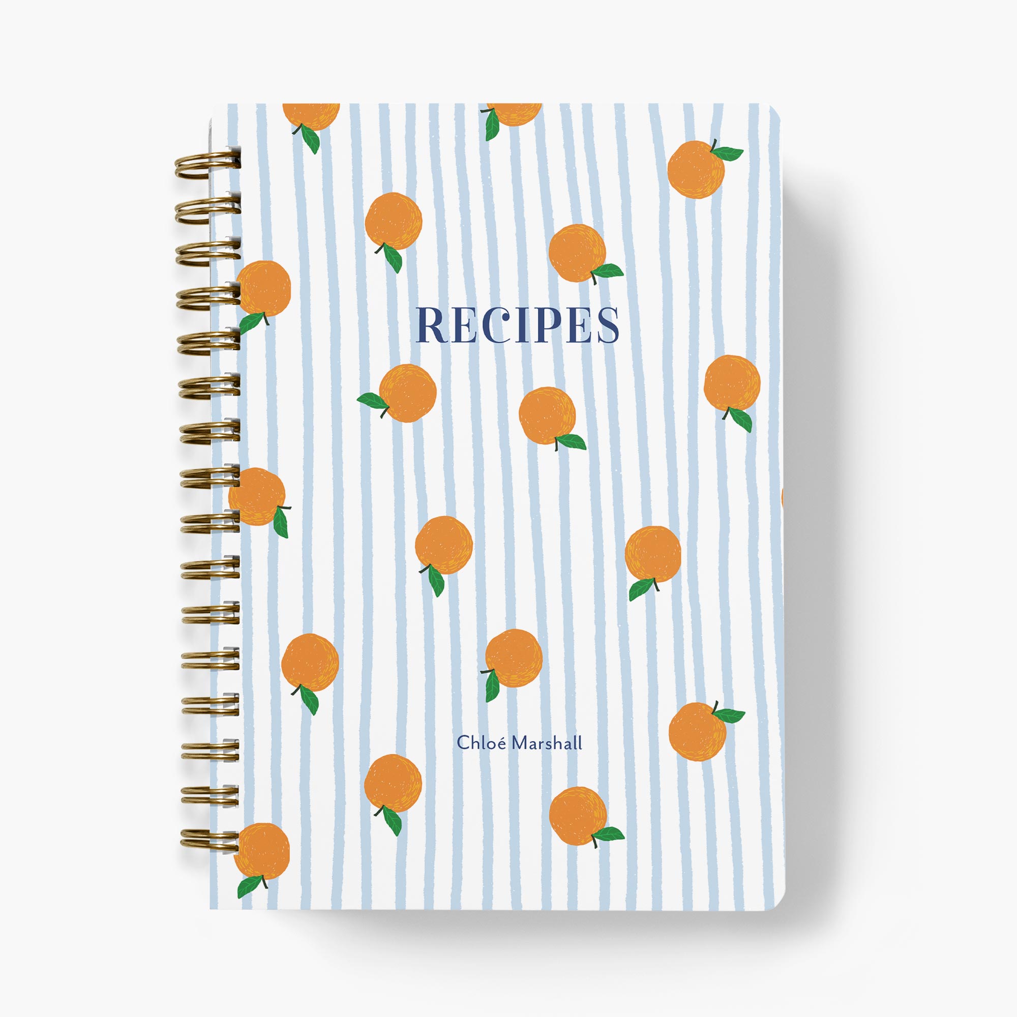 Custom recipe journal in a blue and white stripe with cute orange pattern on a white background.