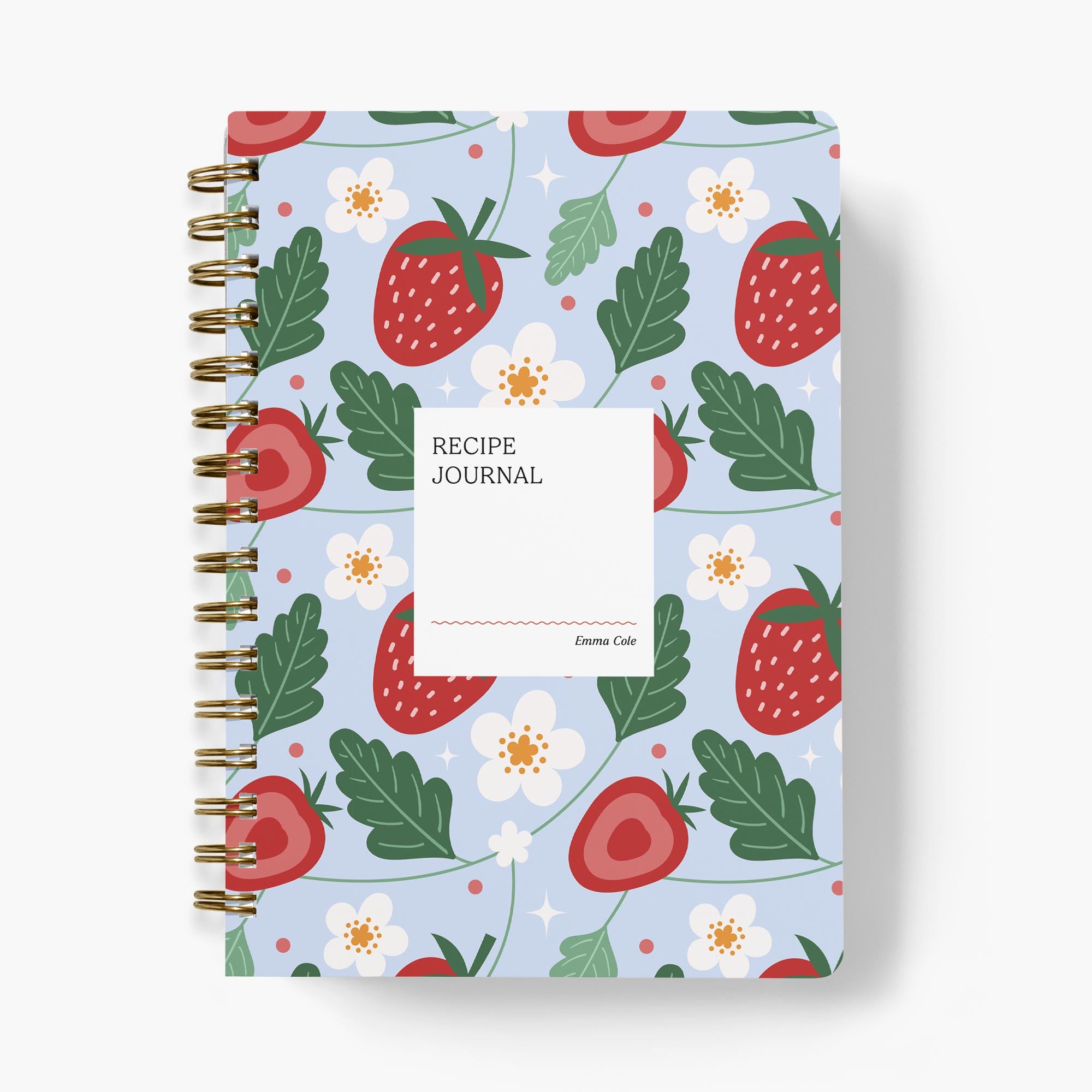 Custom recipe journal with strawberry and floral pattern on a light blue background