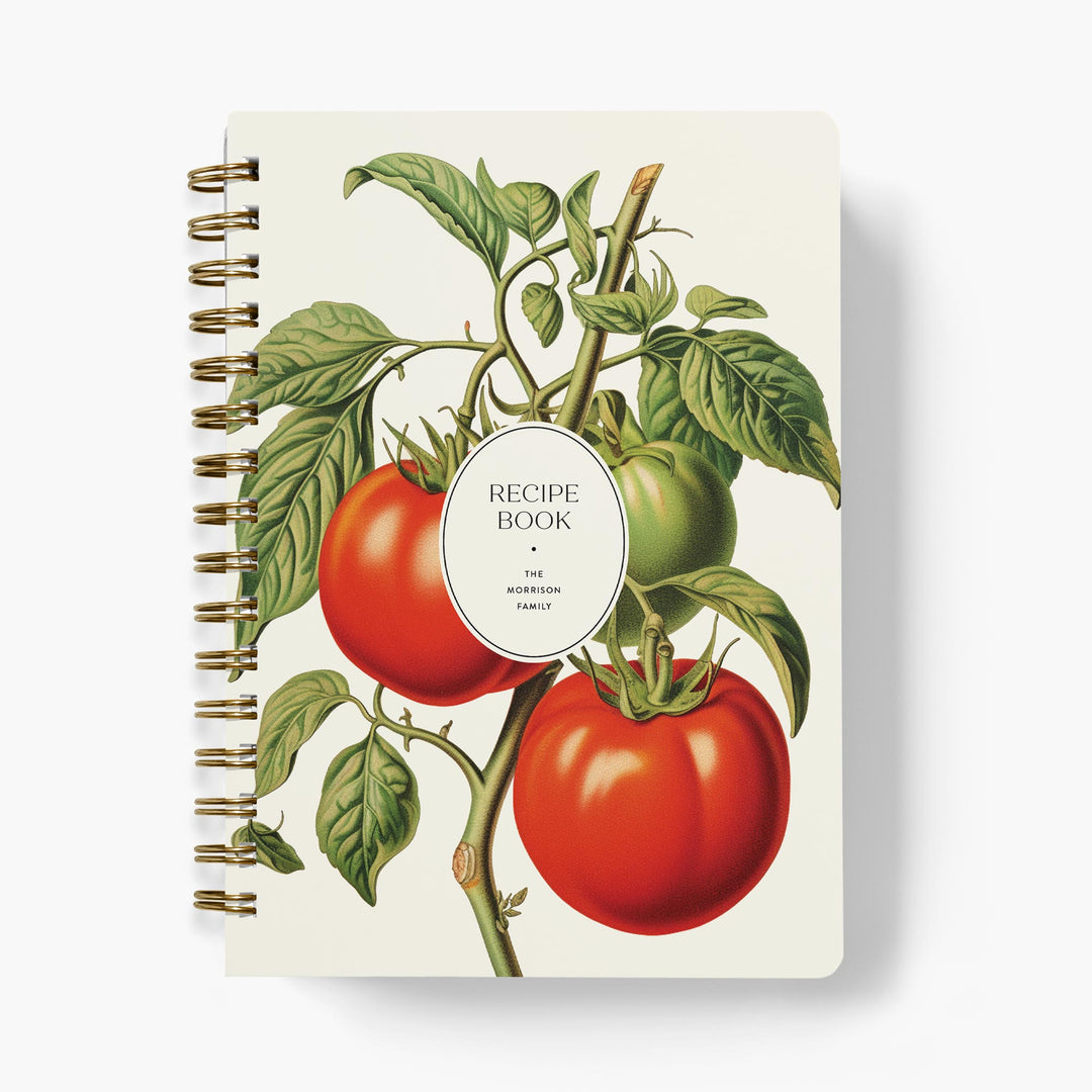 Custom recipe book with botanical tomato illustration on a white background