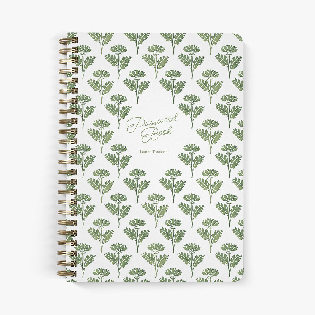 Custom password book in a green and white floral ink block pattern with gold wire binding