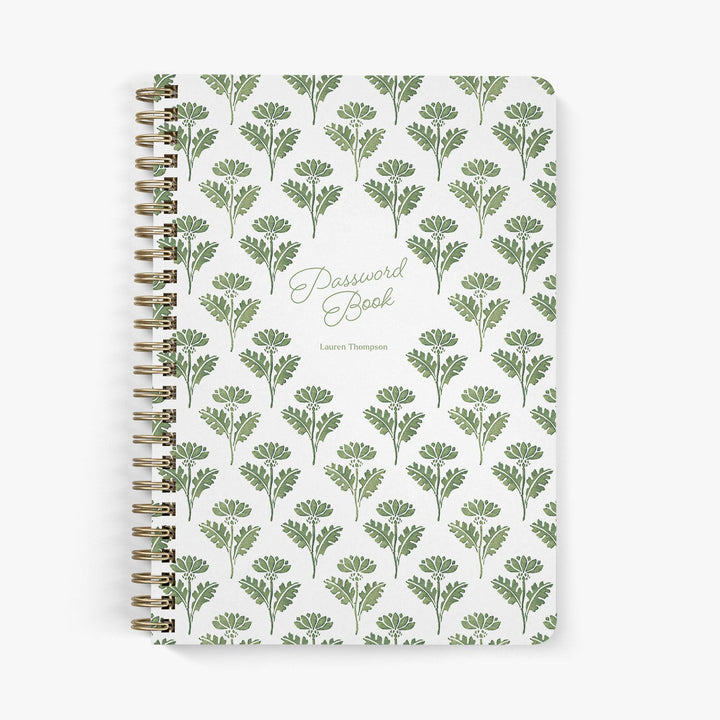 Custom password book in a green and white floral ink block pattern with gold wire binding