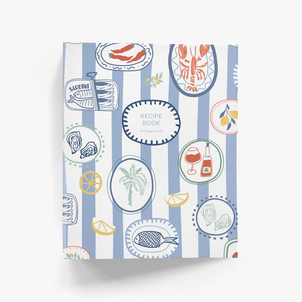 Custom cookbook with a colorful Italian sea-themed cover on a white background