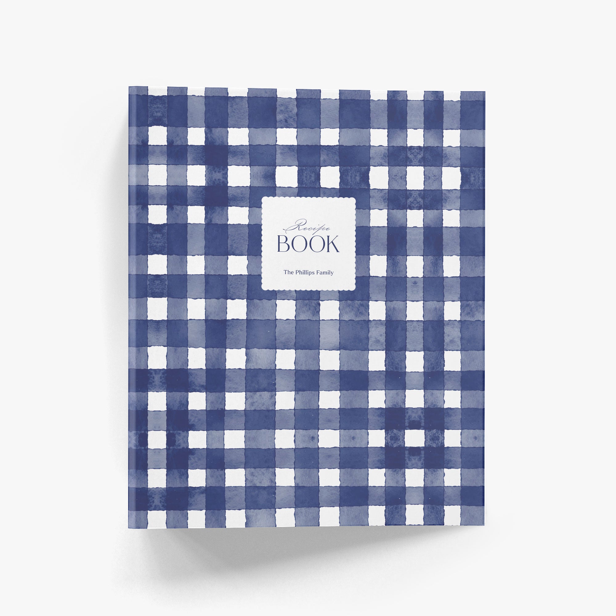 Custom recipe book with blue and white gingham pattern on a white background