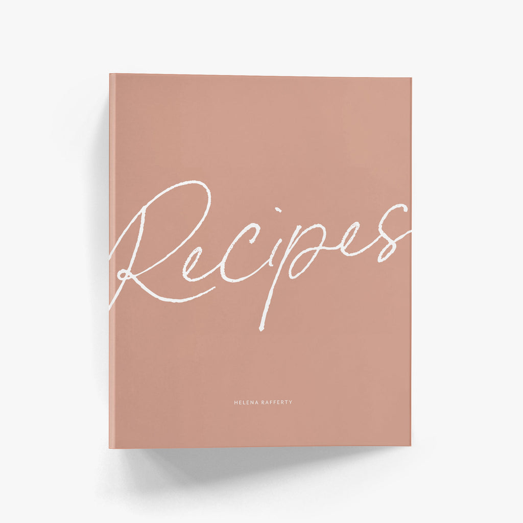 Custom recipe binder with bold calligraphy script says 'Recipes' on the cover above your personalization.