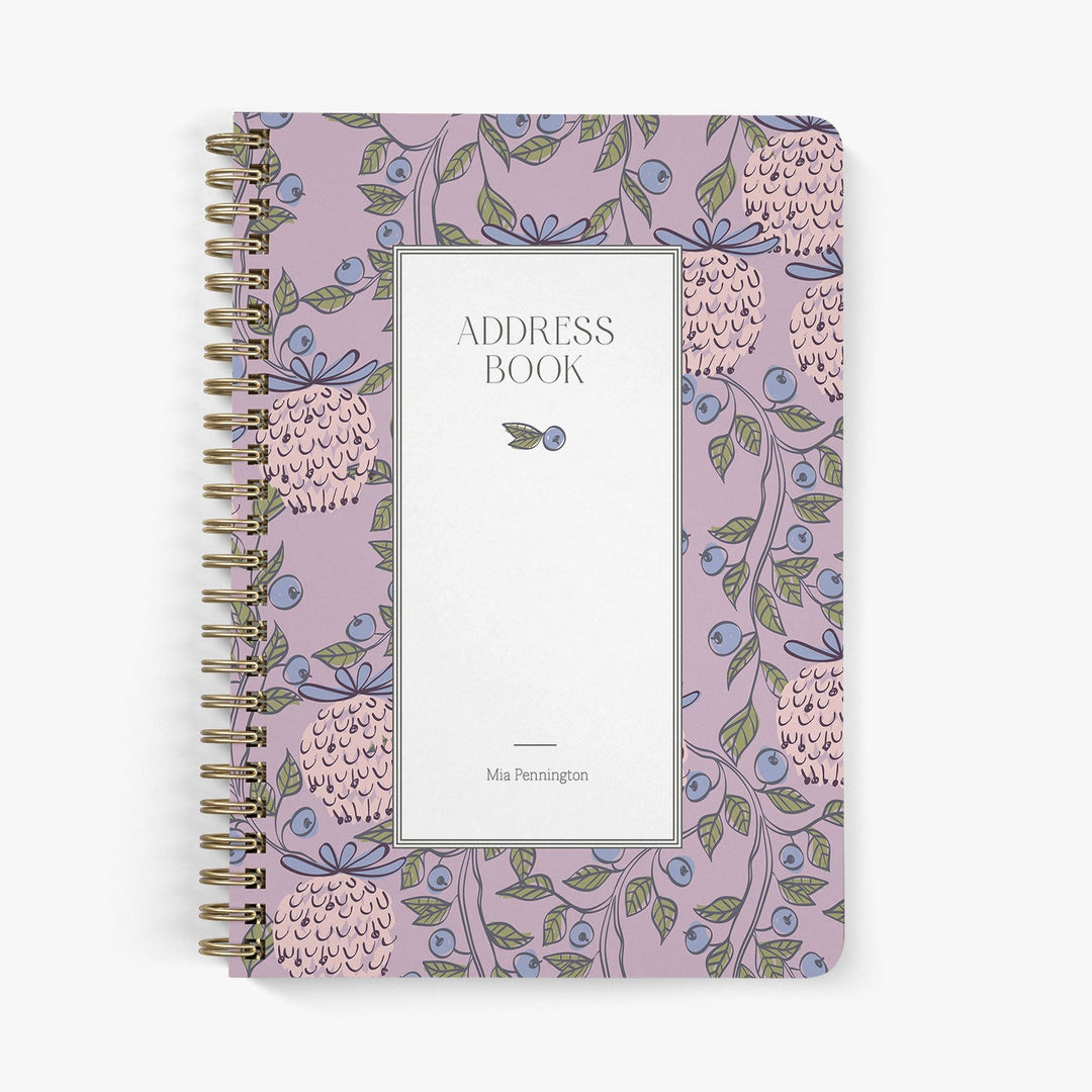 Custom address book with William Morris inspired berry garden design on a white background