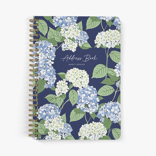 Personalized address book with blue and white hydrangea floral design on a white background