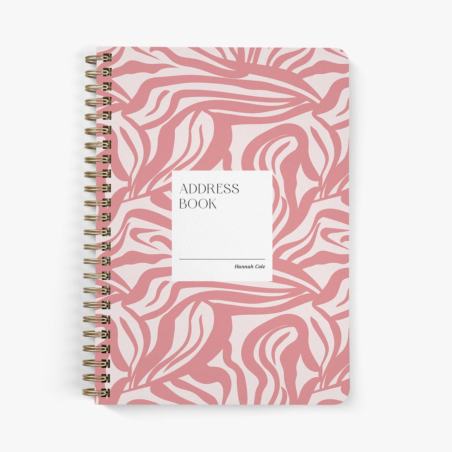 Custom address book with modern pink abstract pattern on a white background