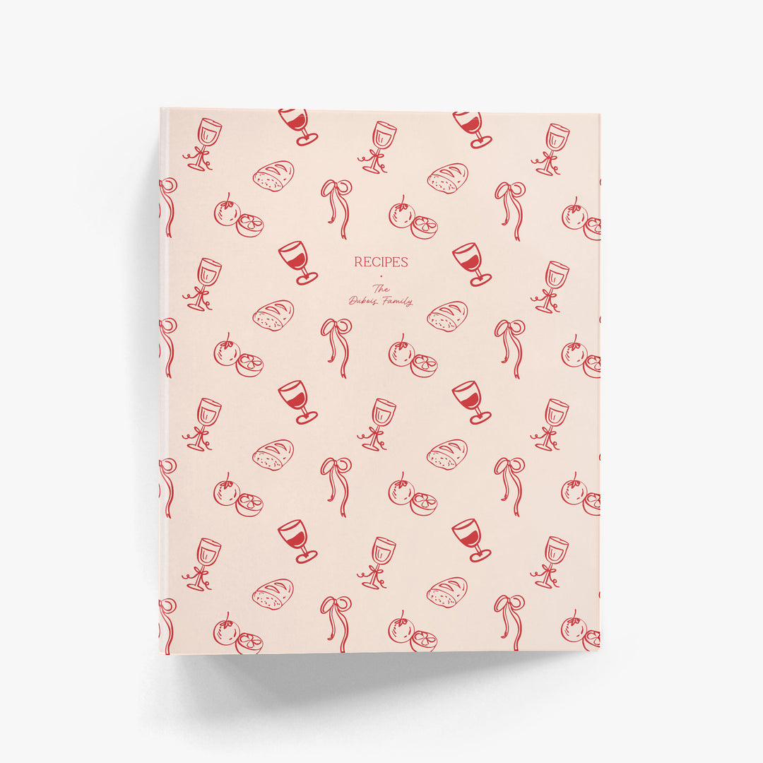 Custom recipe binder with an adorable French-inspired doodle pattern of wine, bread and bows in pink and red