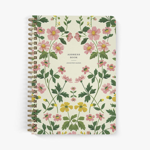 Custom address book with vintage floral design on a white background