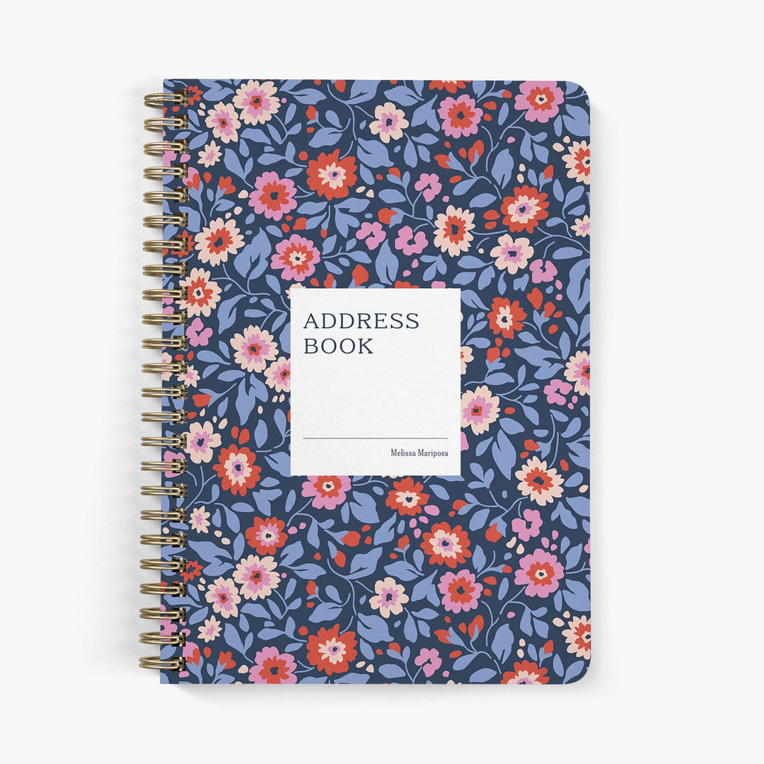 Custom address book with preppy red, pink and blue floral pattern on a white background