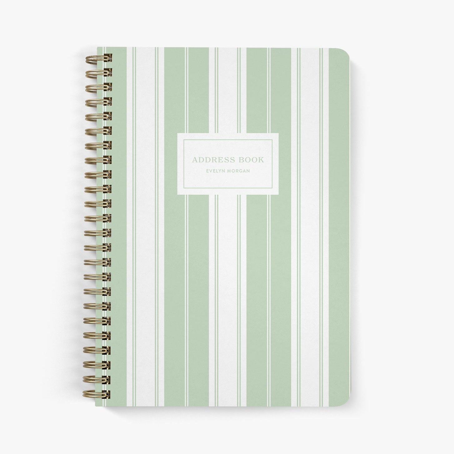 Custom address book with green and white striped cover on a white background