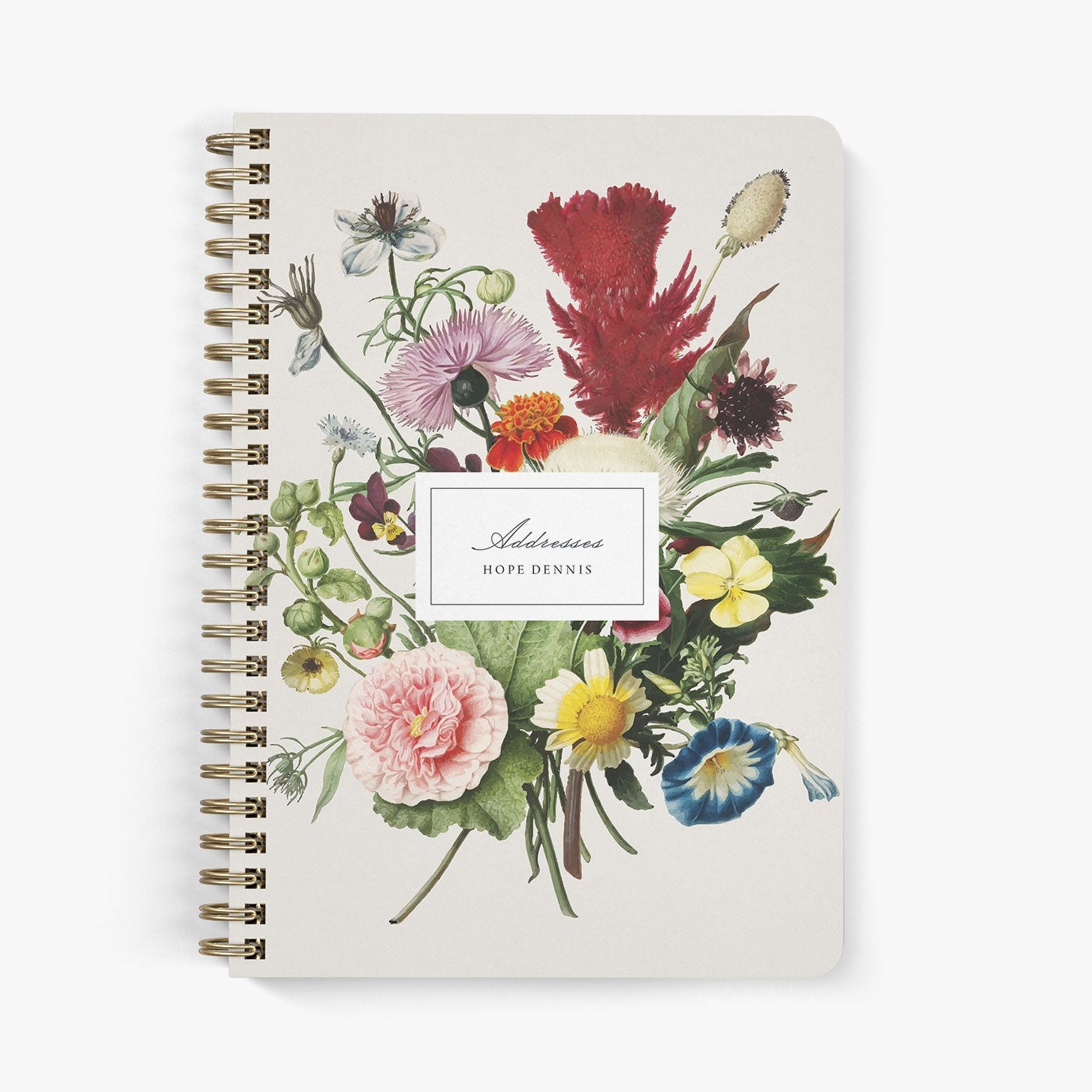Custom address book with vintage floral bouquet on a beige background paired with stylish script