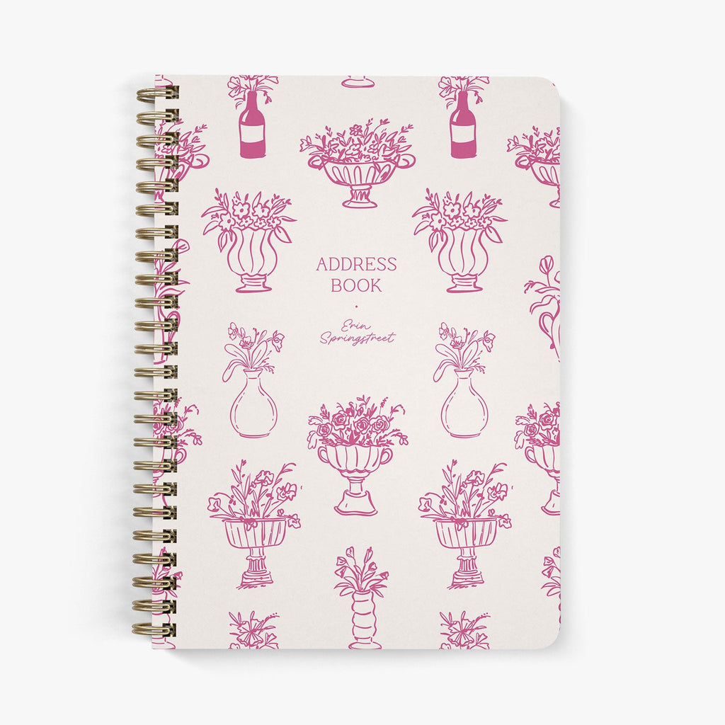 Custom address book with whimsical flowers in hand drawn vases in shades of pink on a white background