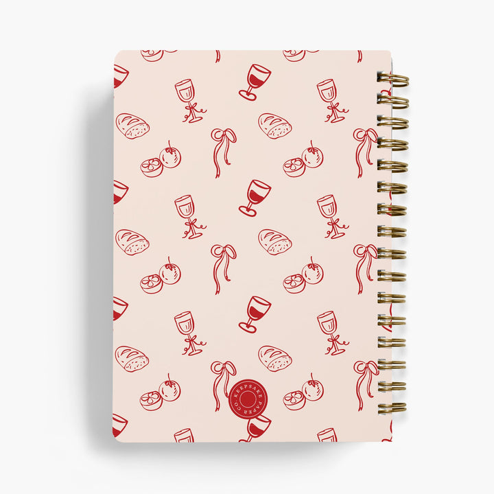 Personalized recipe notebook in a pink and red doodle pattern with bread, wine, bows and tomatoes 