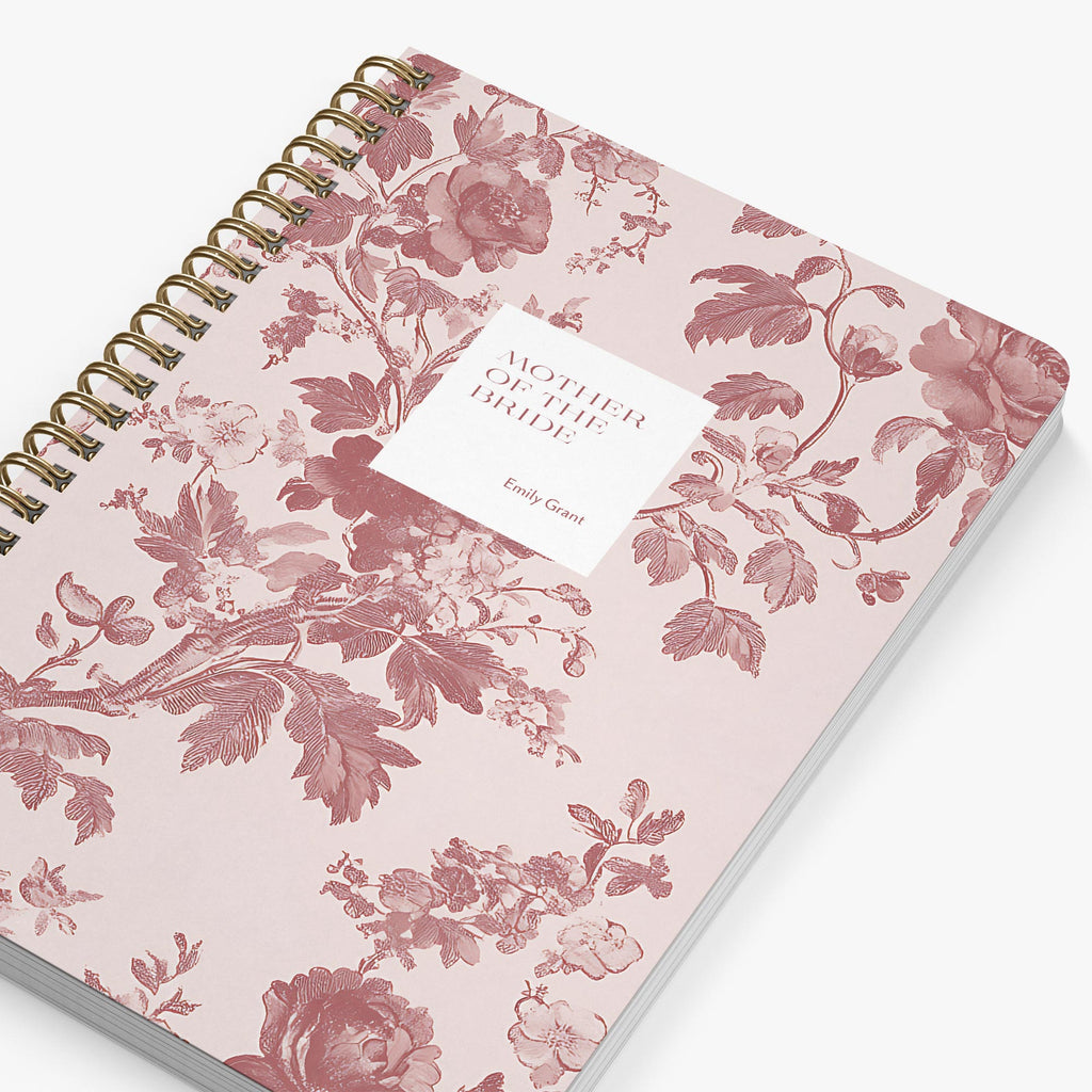 Mother of the Bride Planner — Blush Toile design, angled view showing cover and spine