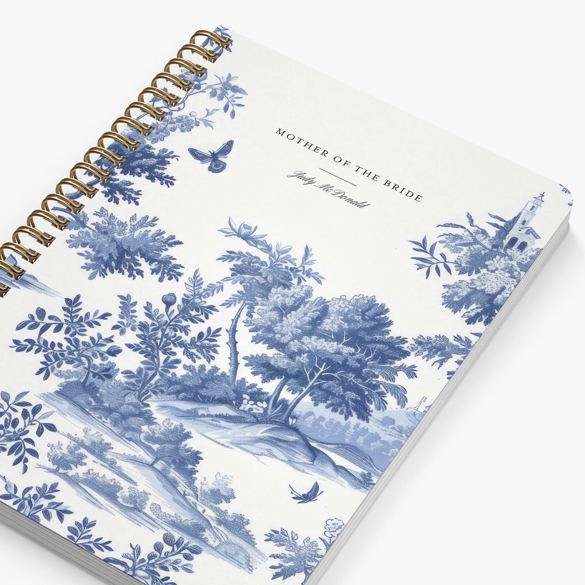Mother of the Bride Planner — Classic Toile design, angled view showing cover and spine