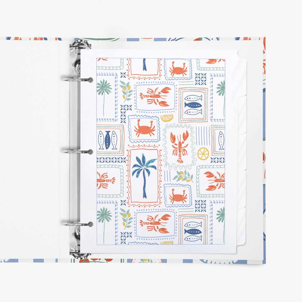 Custom binder tabs with an Italian seaside pattern inside a 3-ring binder on a white background
