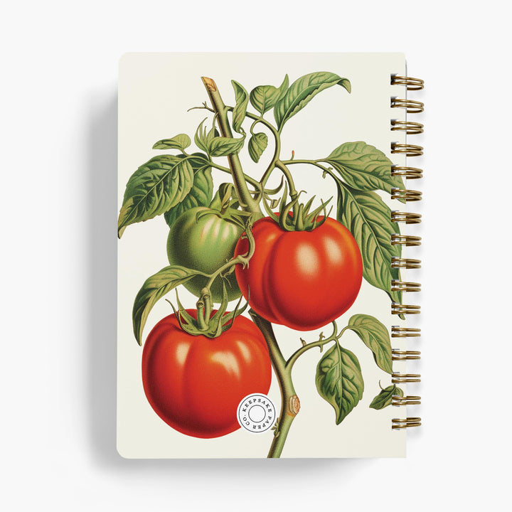 Personalized recipe notebook with red and green tomato illustration on a white background
