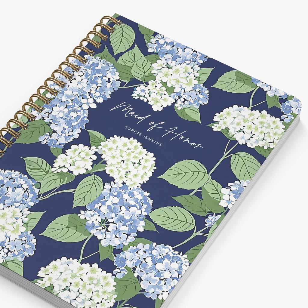 Maid of Honor Planner — Cape Hydrangea design, angled view showing cover and spine