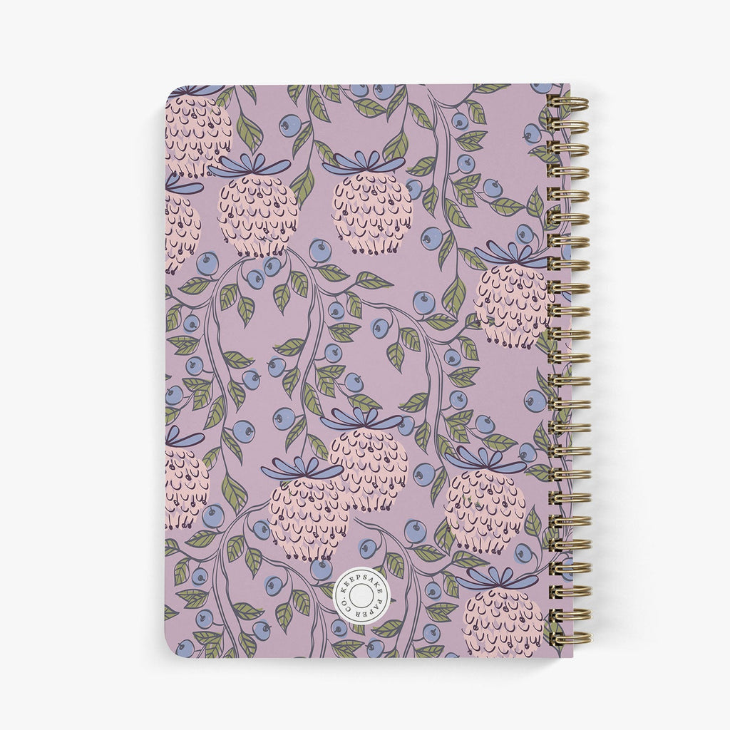 Back view of personalized password notebook with whimsical berry garden design bound with gold wire