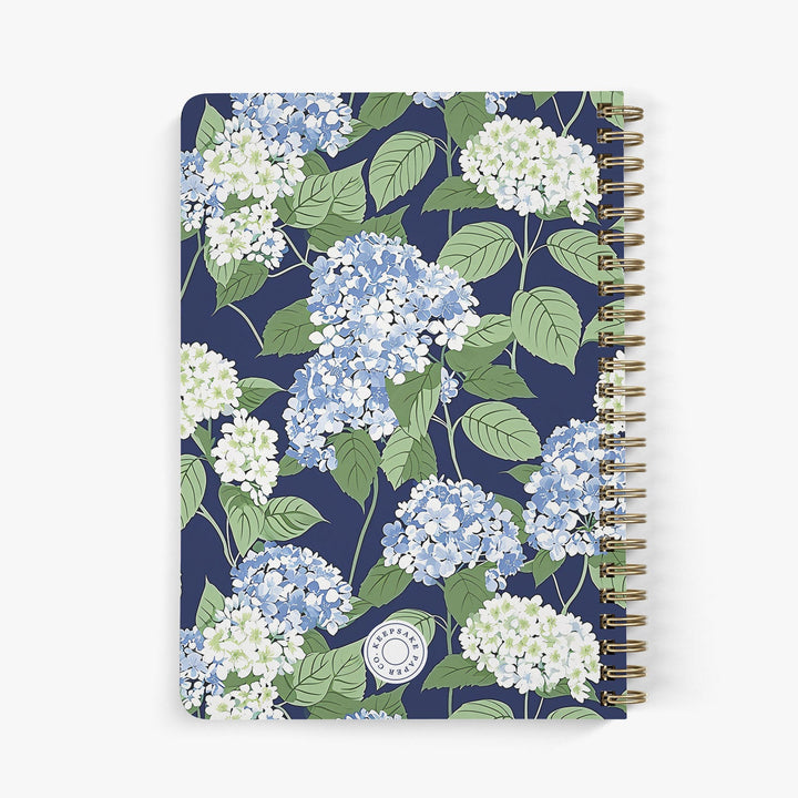 Back view of a personalized password notebook featuring a blue and white hydrangea pattern