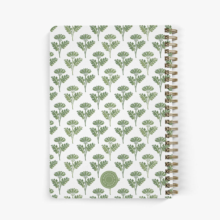 Back view of personalized address notebook with green and white ink block floral pattern