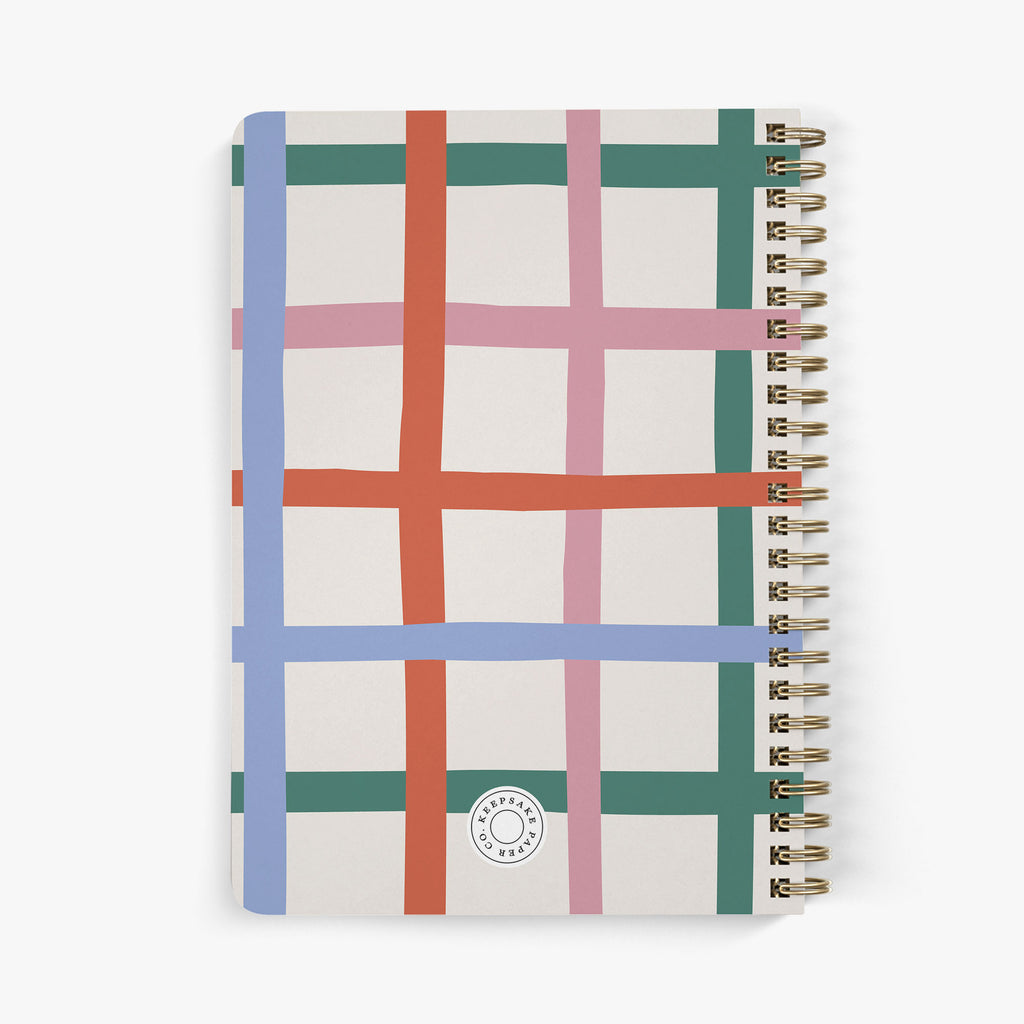 Back view of personalized password notebook with gold wire binding and colorful grid pattern