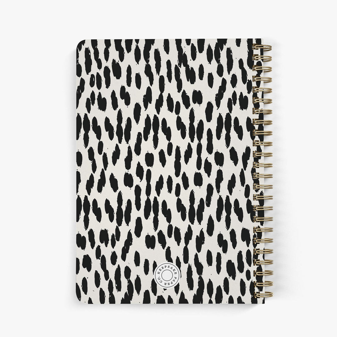 Back view of personalized password notebook with black and beige animal print on white background