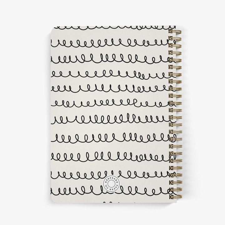 Back view of personalized password notebook with black and beige squiggle design on a white background