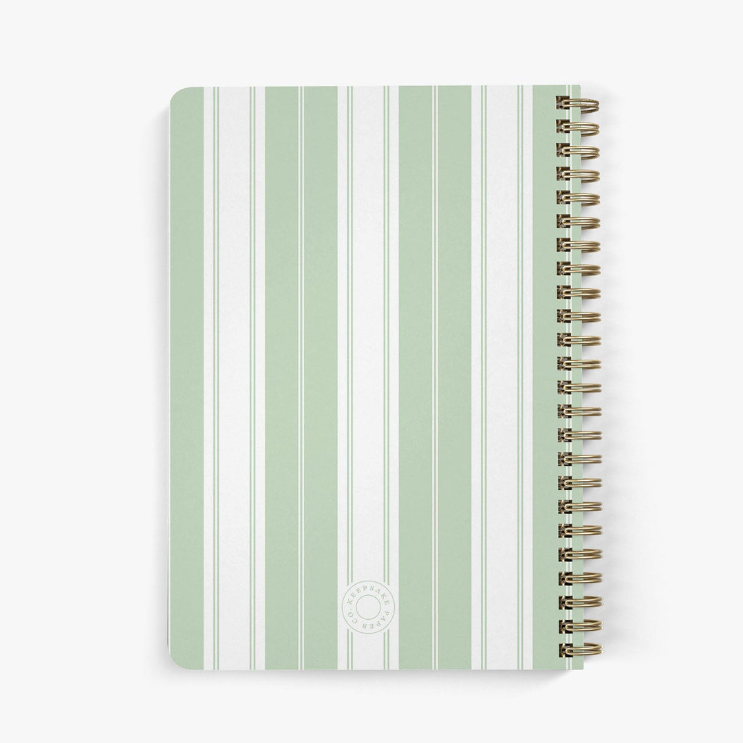 Back view of personalized address notebook with green and white striped cover on a white background