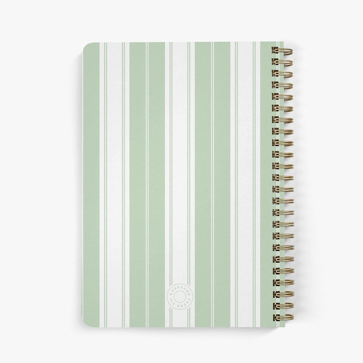 Back view of personalized address notebook with green and white striped cover on a white background