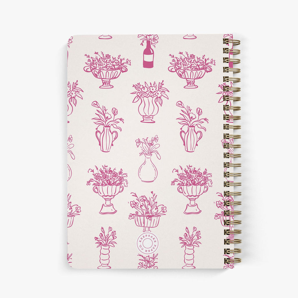 Back view of personalized password notebook with pink floral vases and bound with brass wire