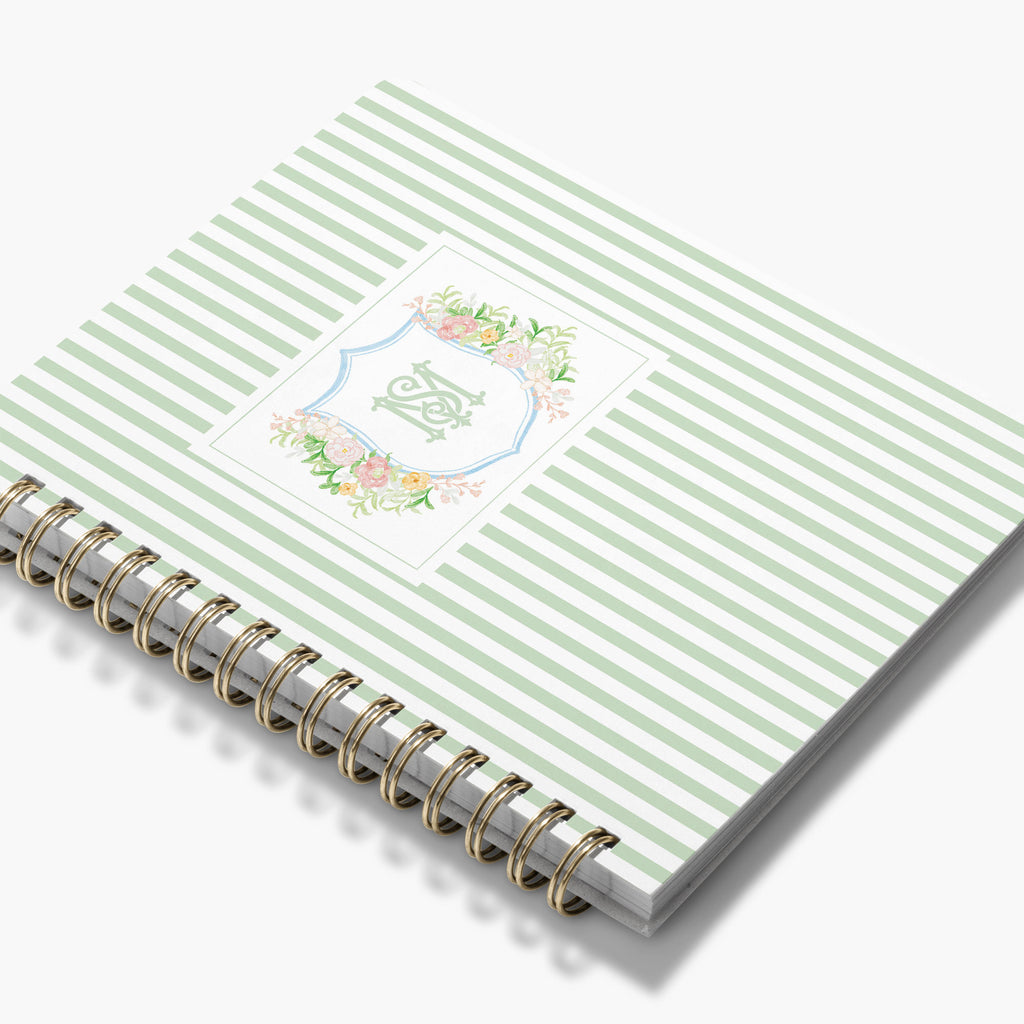 Wedding Planner — Floral Crest design, angled view showing cover and spine