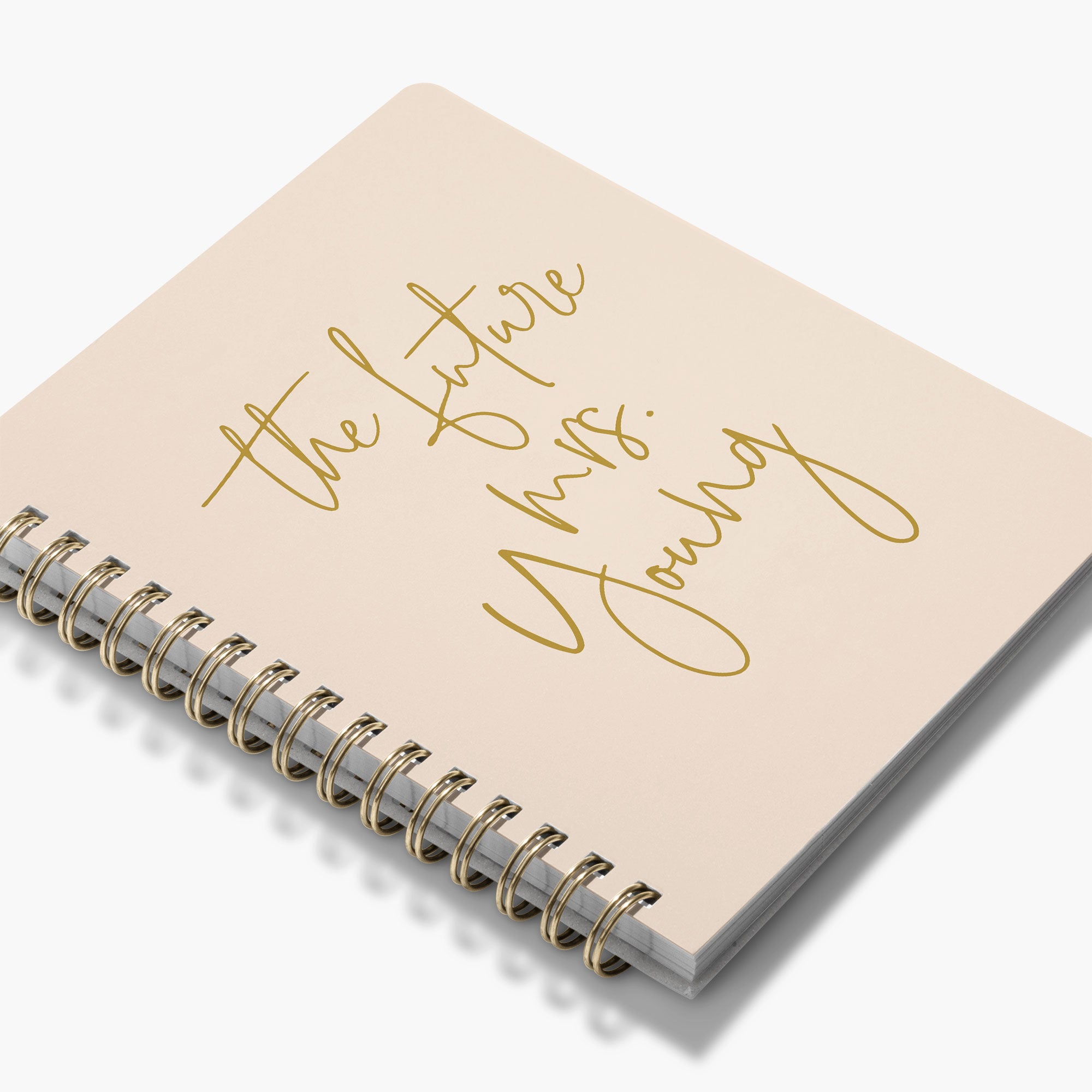 Custom wedding planning notebook with 'the future mrs.' in gold text on a white background