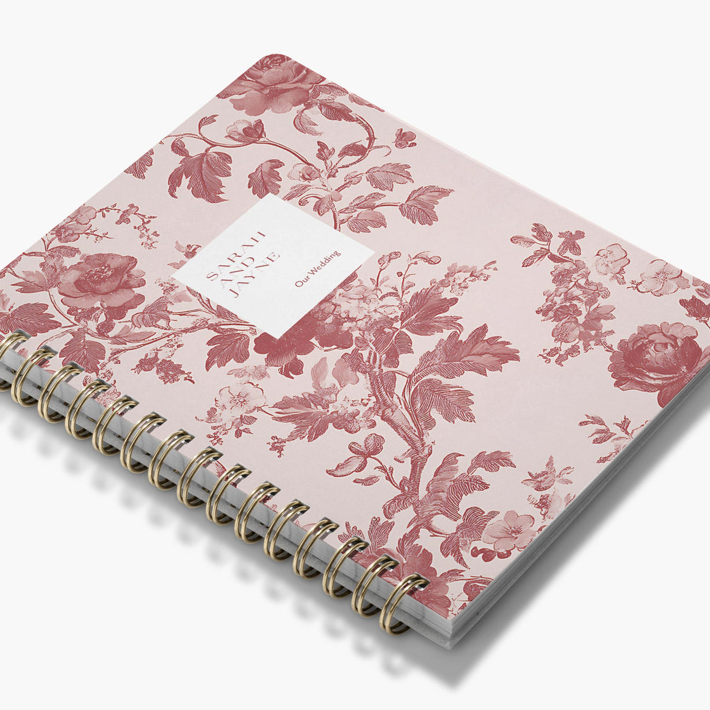 LGBT Wedding Planner — Blush Toile design, angled view showing cover and spine
