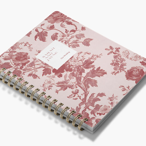 LGBT Wedding Planner — Blush Toile design, angled view showing cover and spine