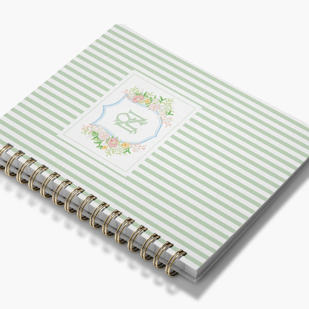 LGBT Wedding Planner — Floral Crest design, angled view showing cover and spine