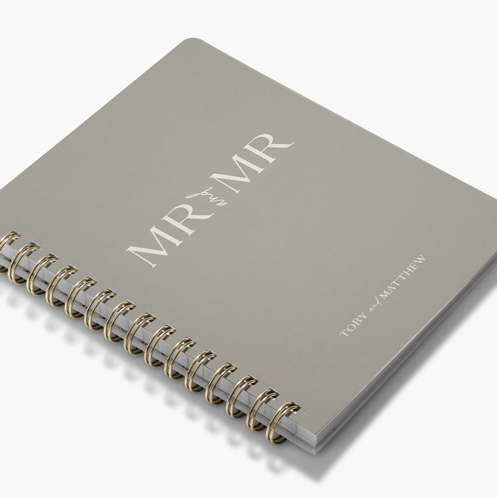 Custom gender-neutral wedding planner with 'MR & MR' text on a white background