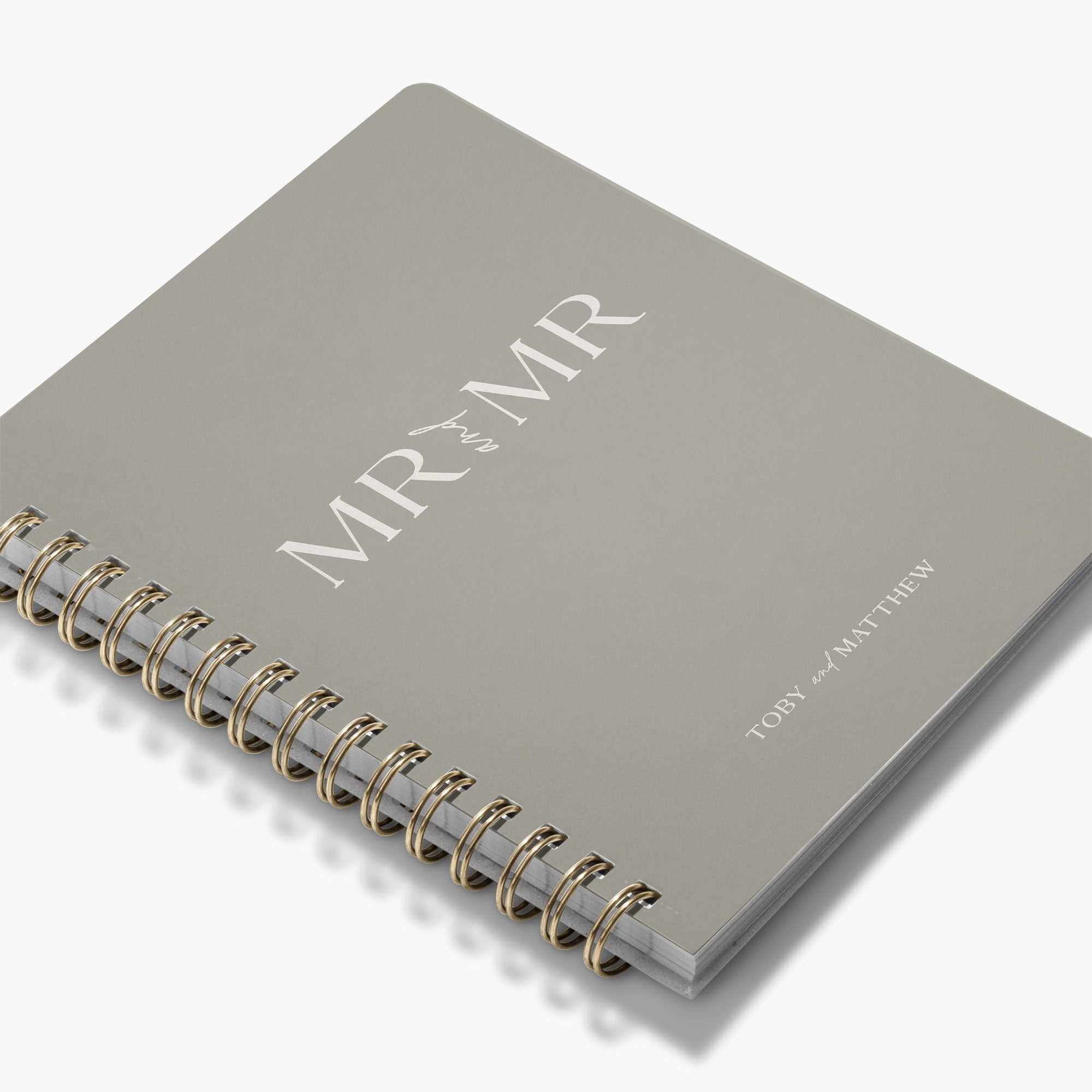 Custom gender-neutral wedding planner with 'MR & MR' text on a white background