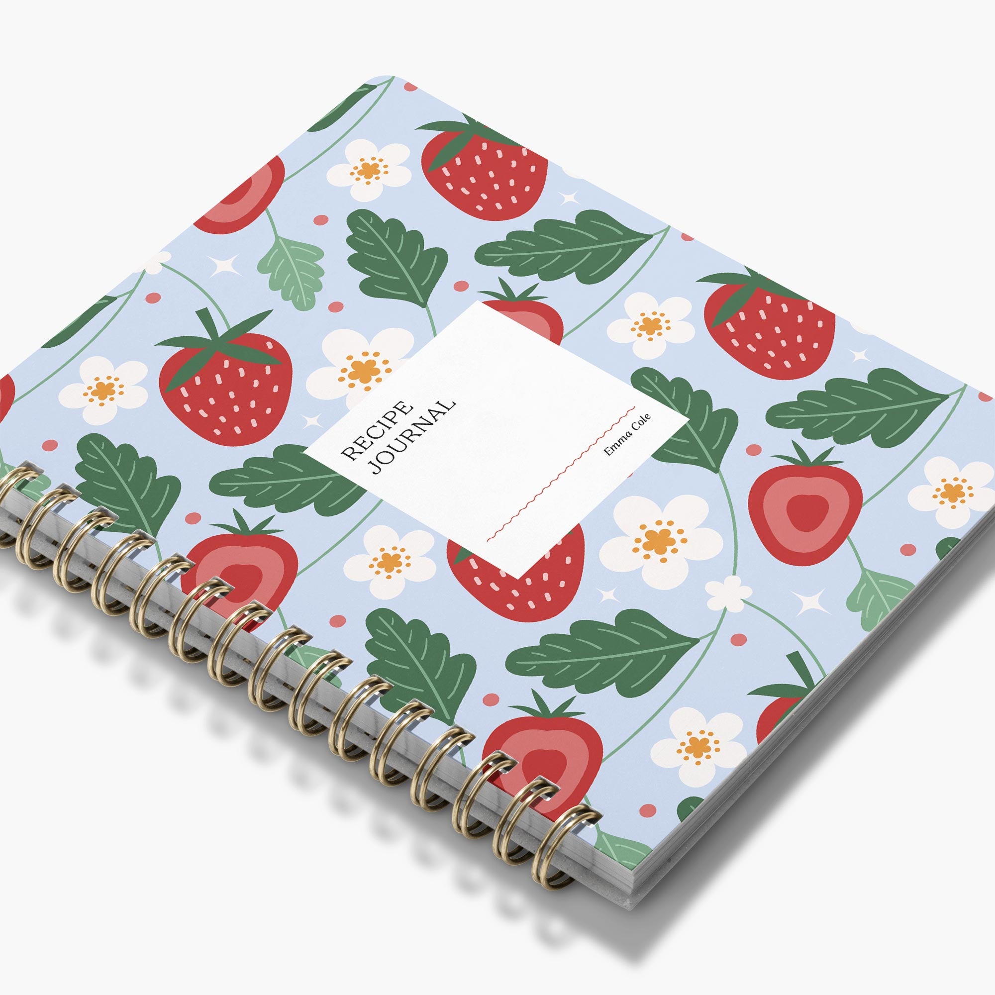 Custom cookbook with colorful strawberry pattern with gold spiral binding 