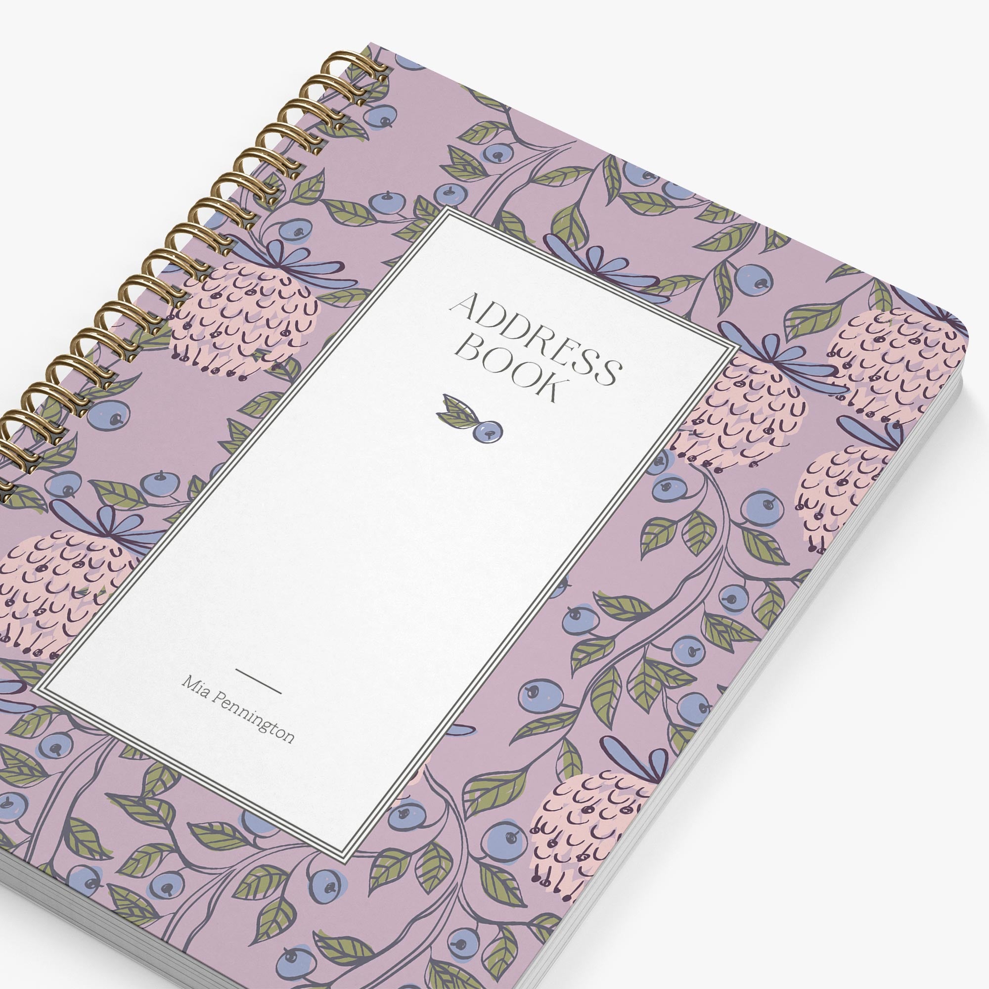 Address book with floral pattern on a white background