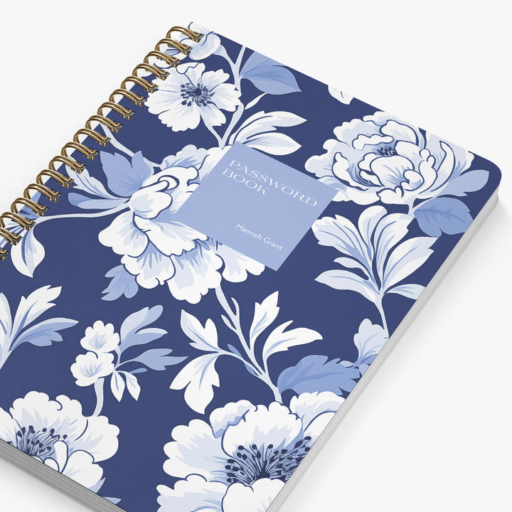 Floral patterned notebook with a password book label on a white background
