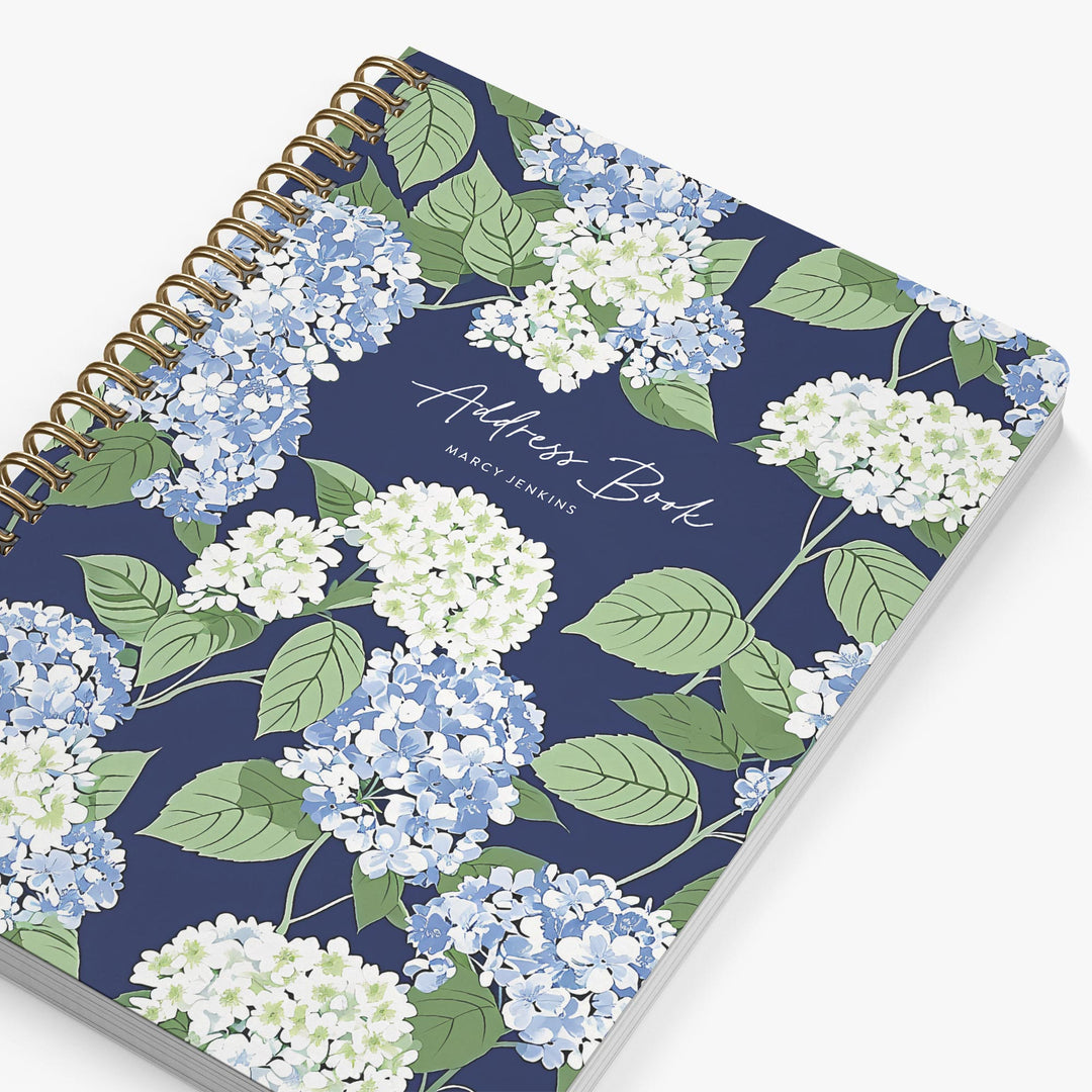 Address book with floral design on a white background