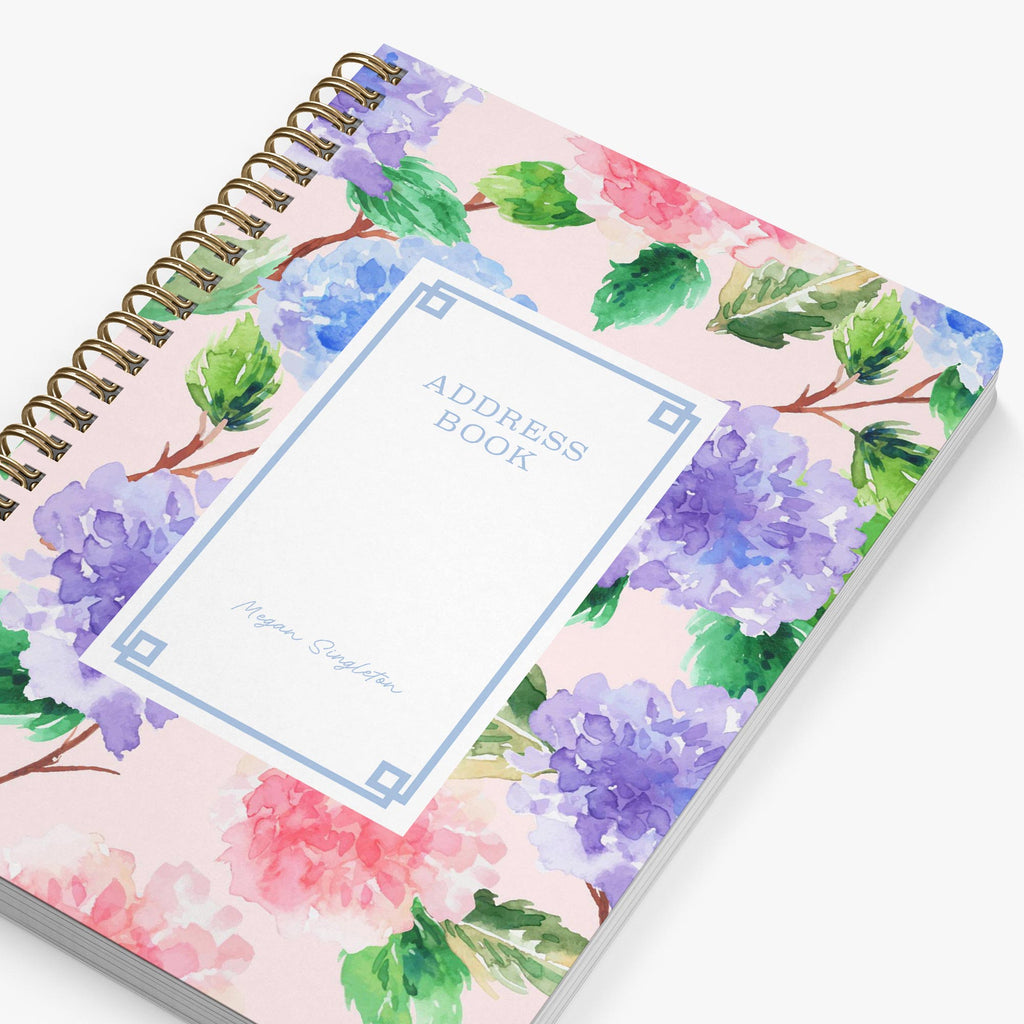 Address book with floral design on a white background