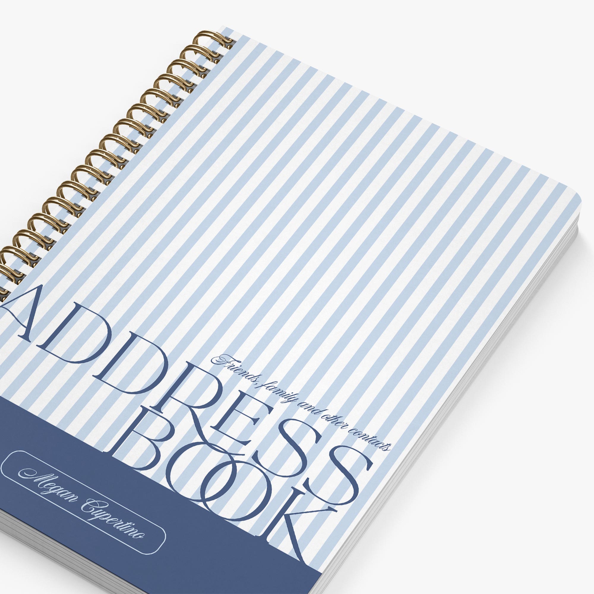 Address book with blue and white striped cover on a white background